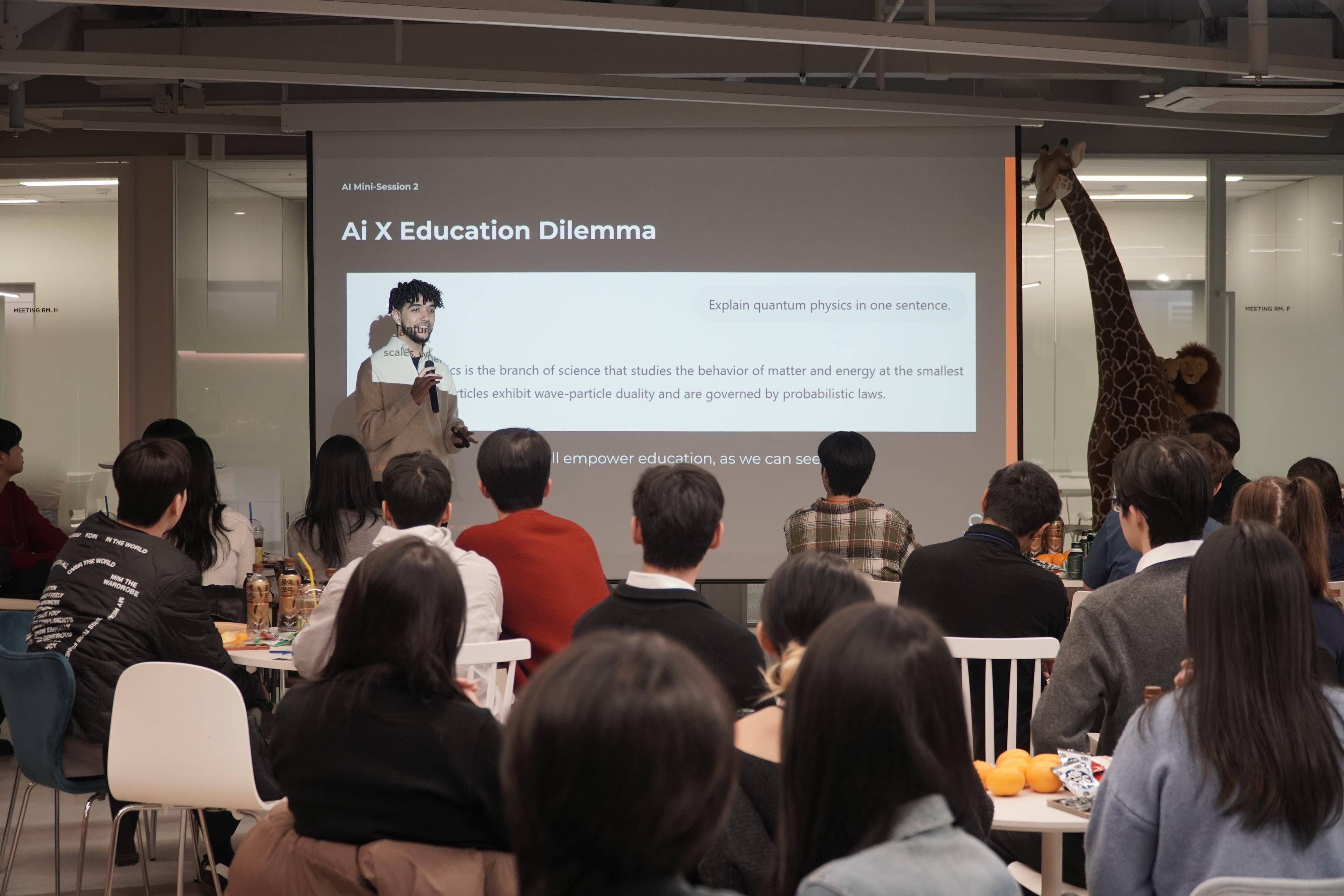 Ahmed Bakr speaking to students about AI in Education